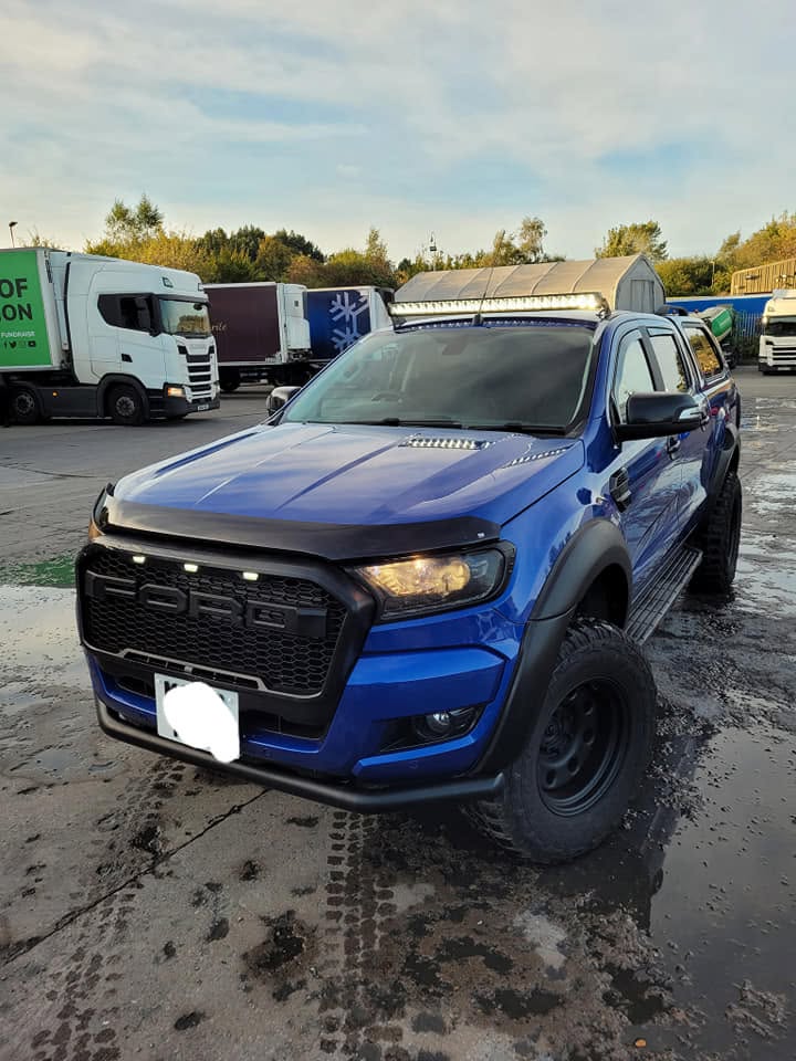 Ford Ranger with roof-mounted LED light bar and custom electrical work